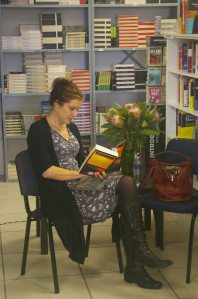 Emma after the launch, reading Siri Hustvedt's The Blazing World
